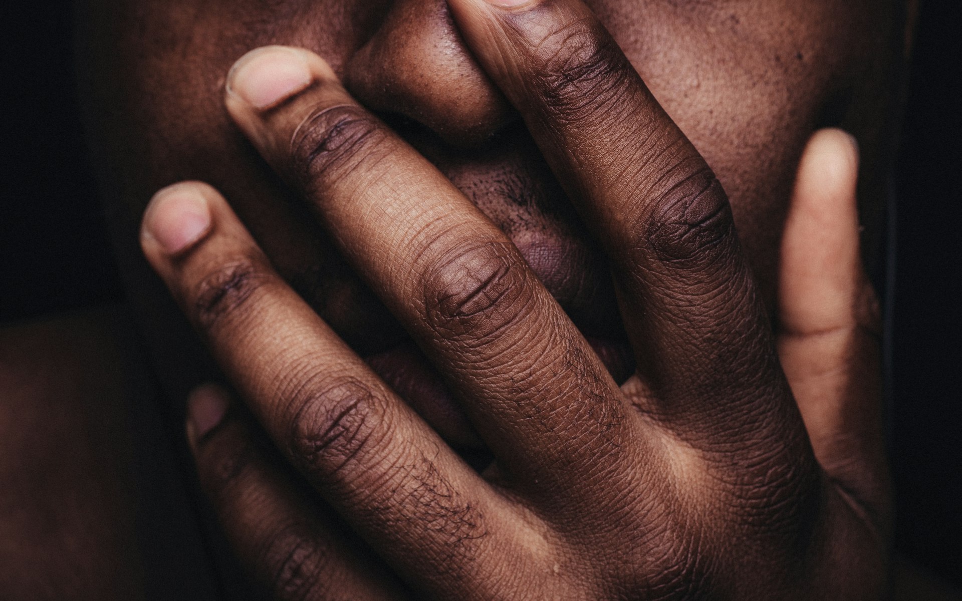 did you know persons hand on his face